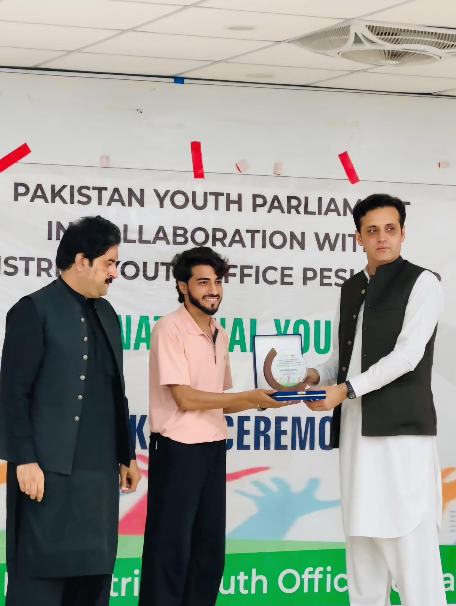 Haseeb Ali receiving recognition from the Pakistan Youth Parliament