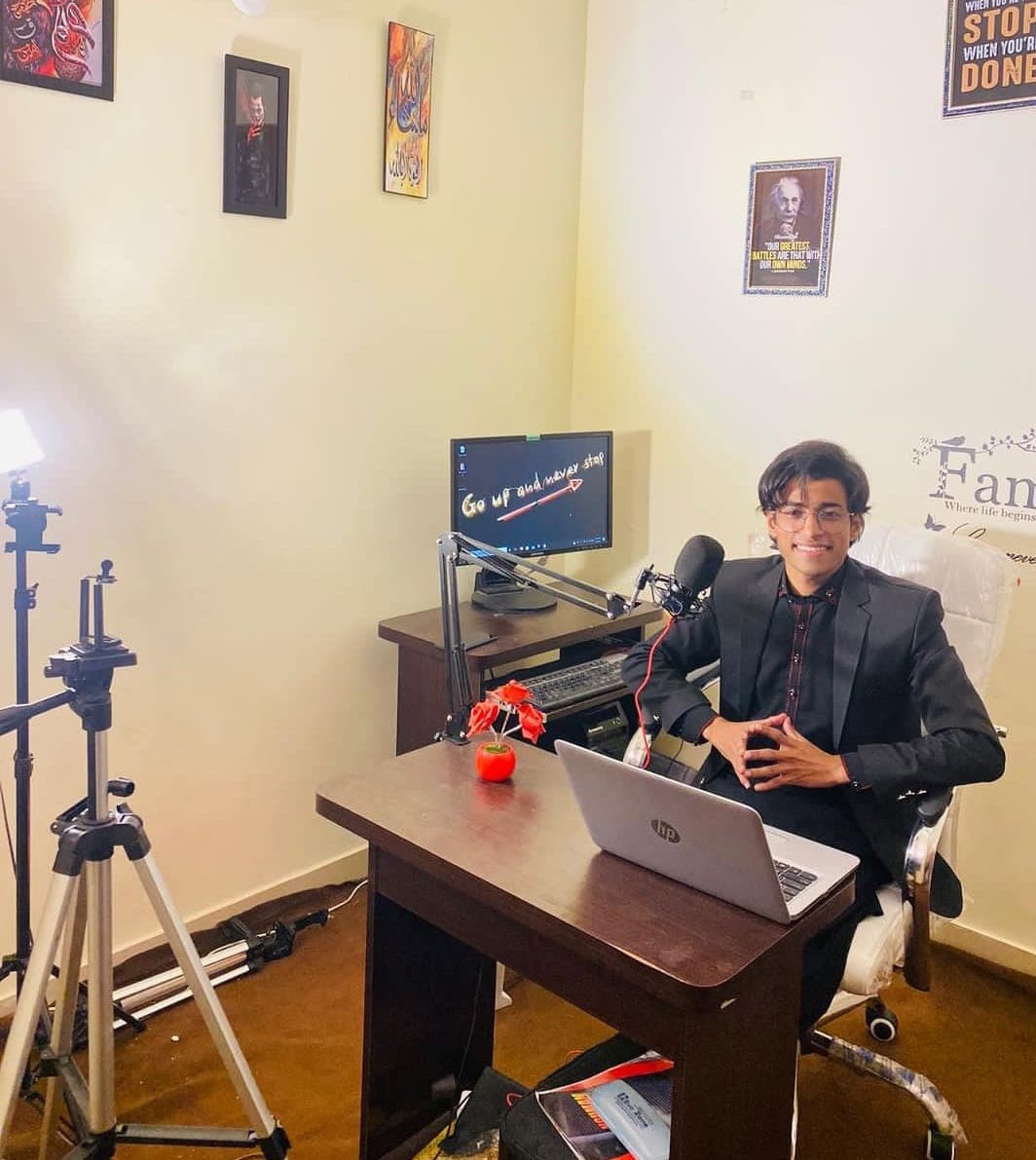 Haseeb Ali in his early office and recording setup
